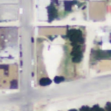 Aerial view, 2012 — the lot is still bare caliche